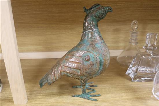 An Islamic bronze bird incense burner